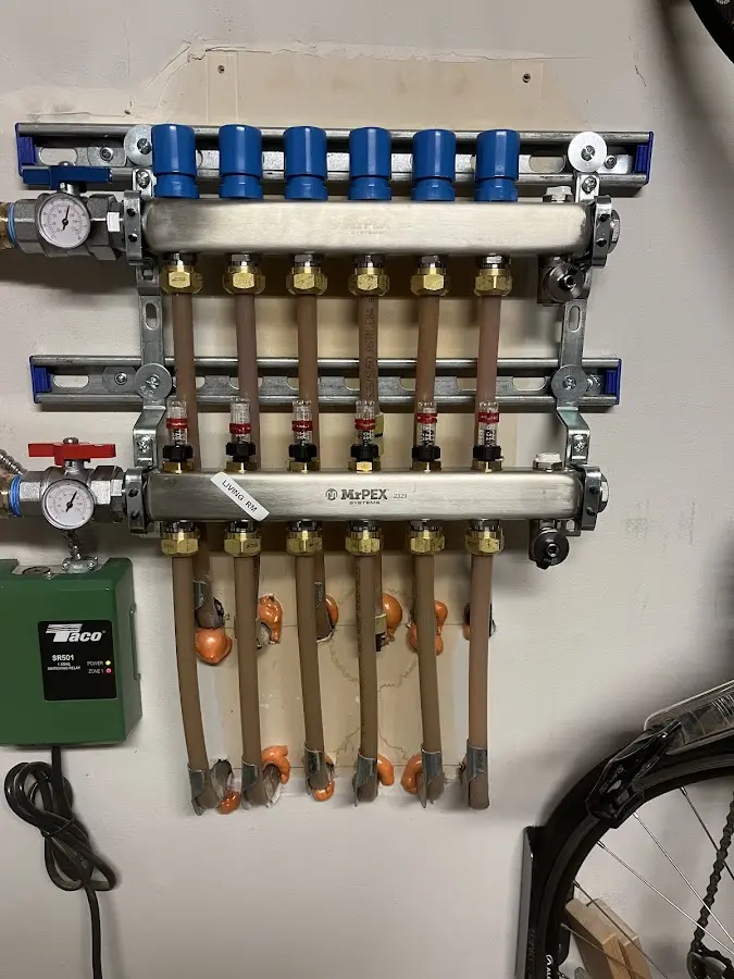 Plumber performing Water Heater Repair at a residential property in Culpeper